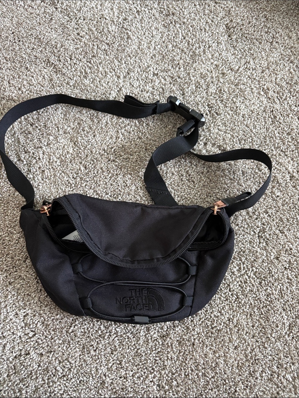 The North Face Black Crossbody Waist Bag with Rose Gold Zippers